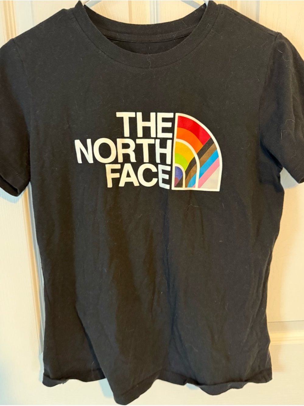 The North Face Black Tee with Multicolor Rainbow Logo